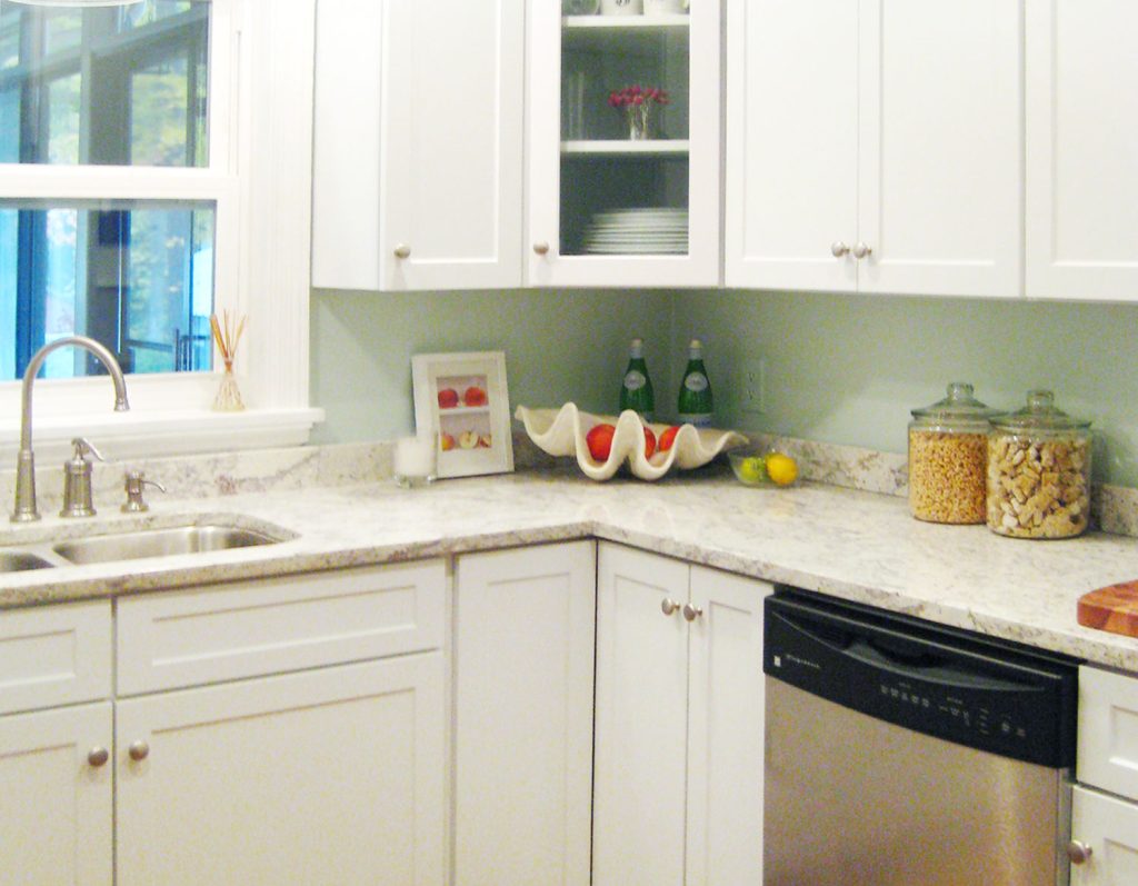 White Kitchen With Clean Granite Countertops