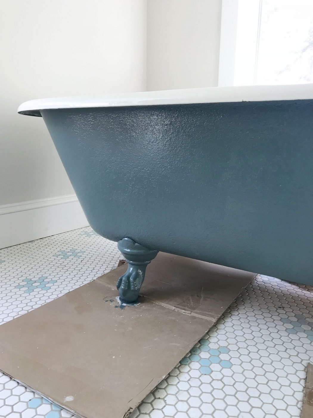 blue clawfoot tub