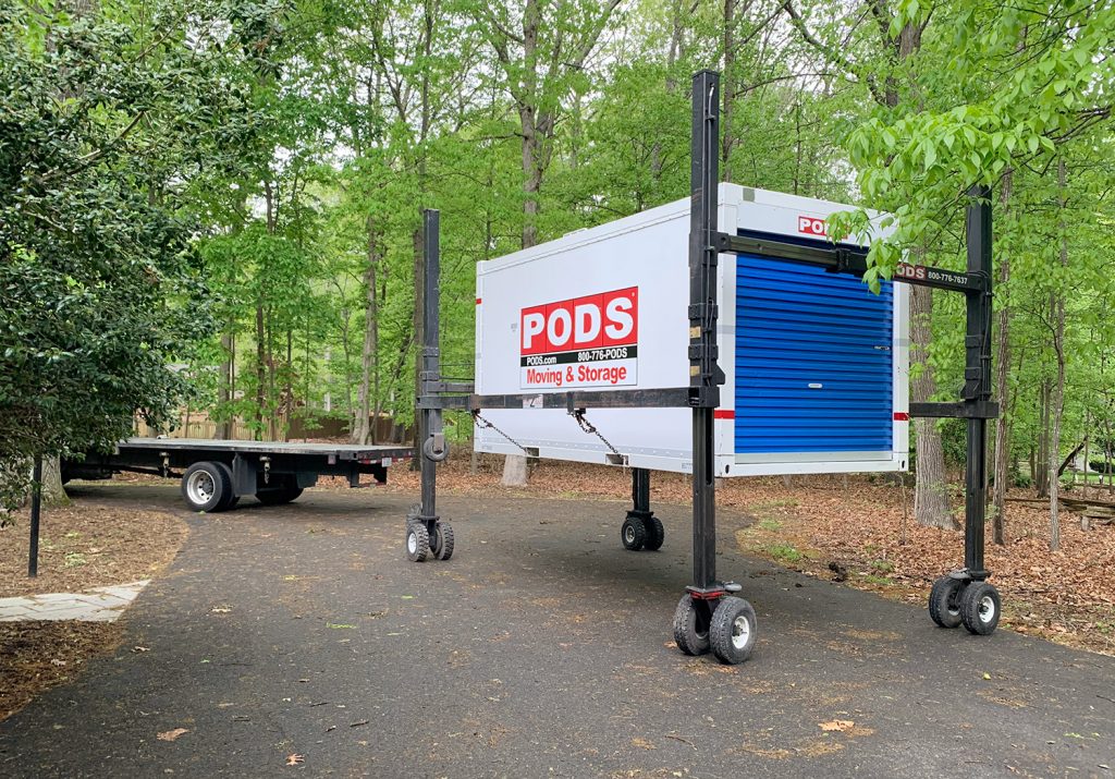 Storage PODS being delivered into driveway