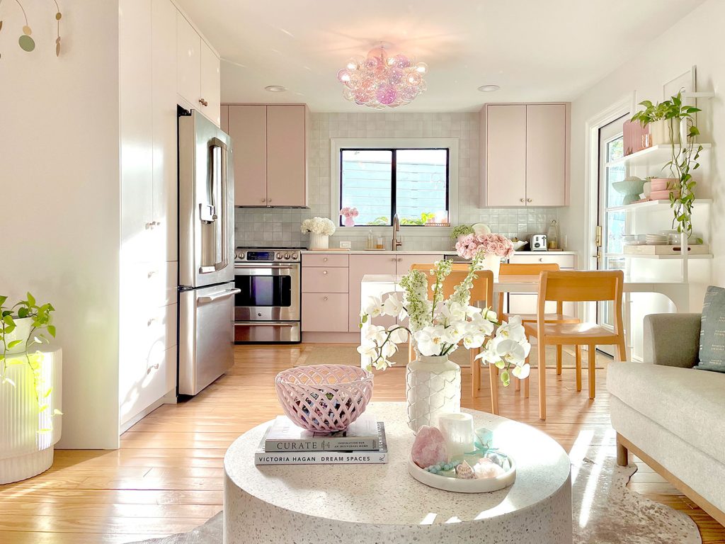 Small Ikea Kitchen With Mauve Cabinets And Seating Area With Terrazzo Coffee Table