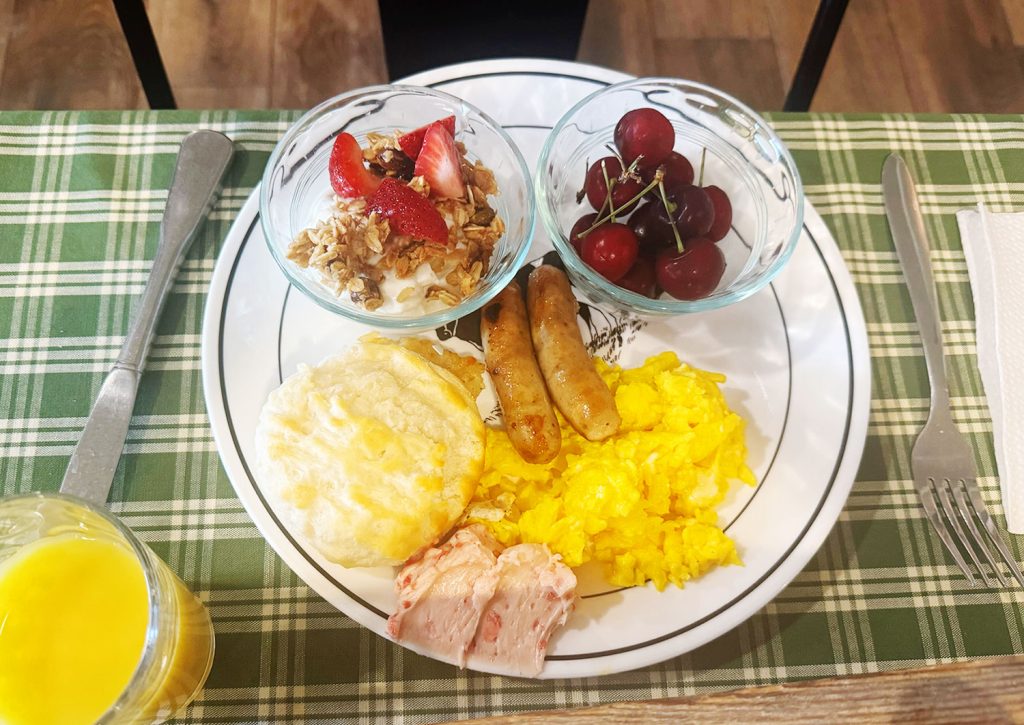 Hearty Midwest Breakfast With Eggs Sausage Biscuits Granola