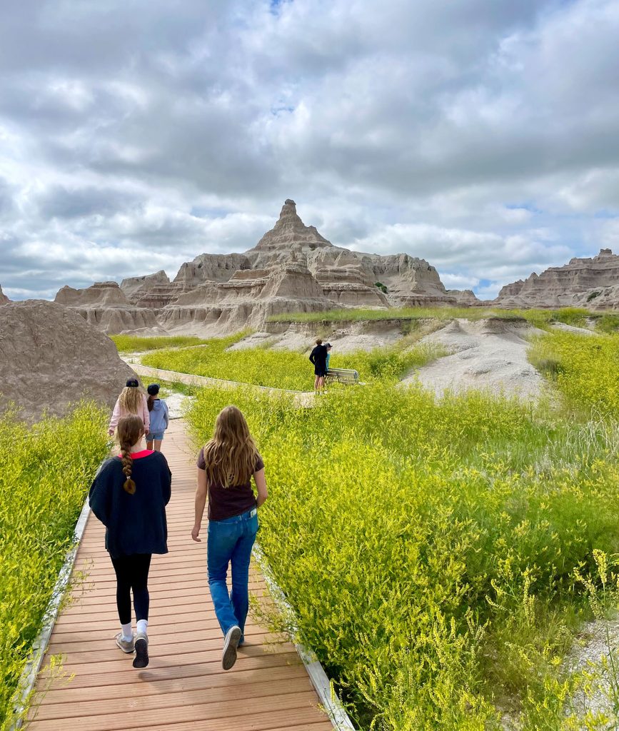 Kids Walking On Boardwalk Hike In Badlands National Park South Dakota