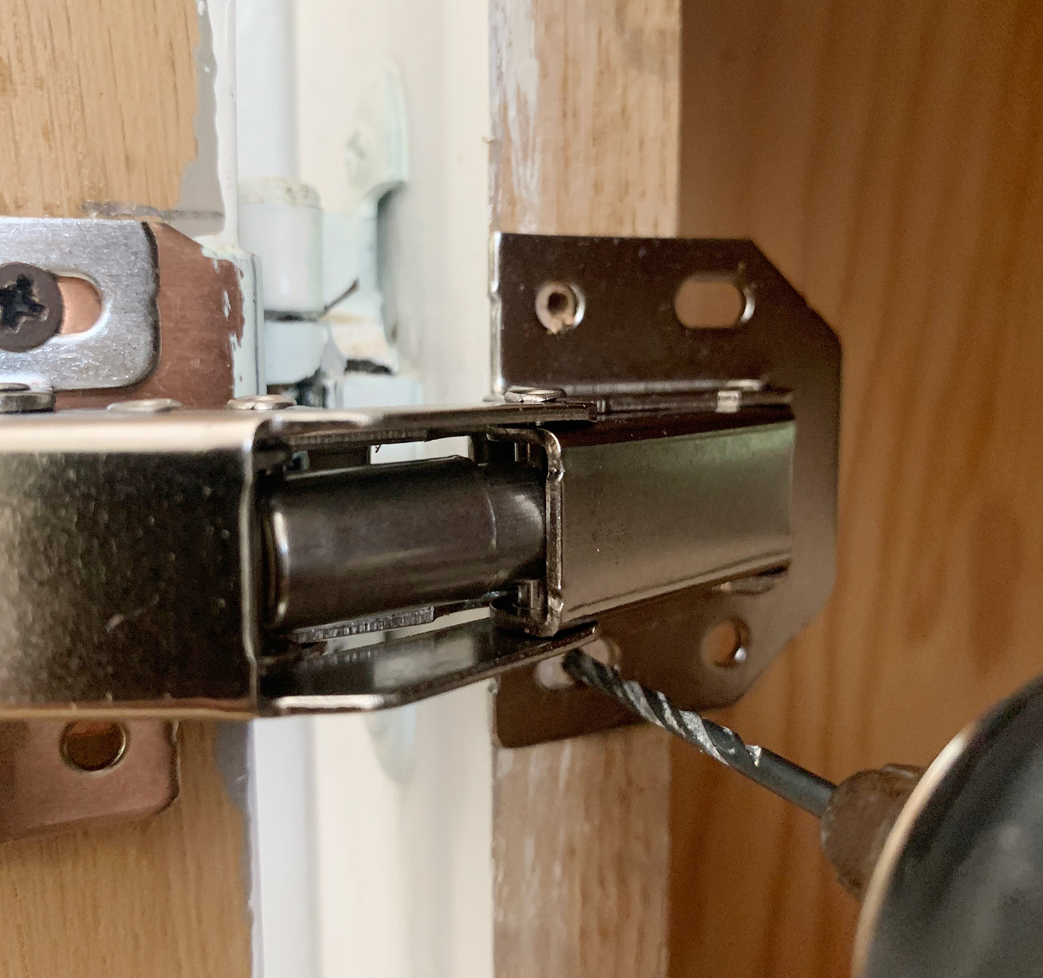 How To Install Hidden Hinges On Cabinets Young House Love   How To Replace Cabinet Hidden Hinges Drilling Pilot 